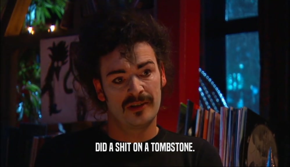 DID A SHIT ON A TOMBSTONE.  