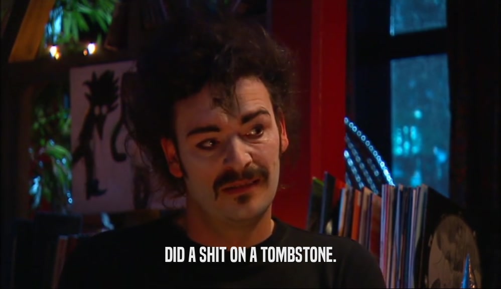 DID A SHIT ON A TOMBSTONE.  