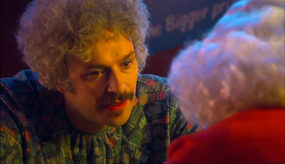 -WHAT COLOUR WAS HER CARDIGAN? -RED. 