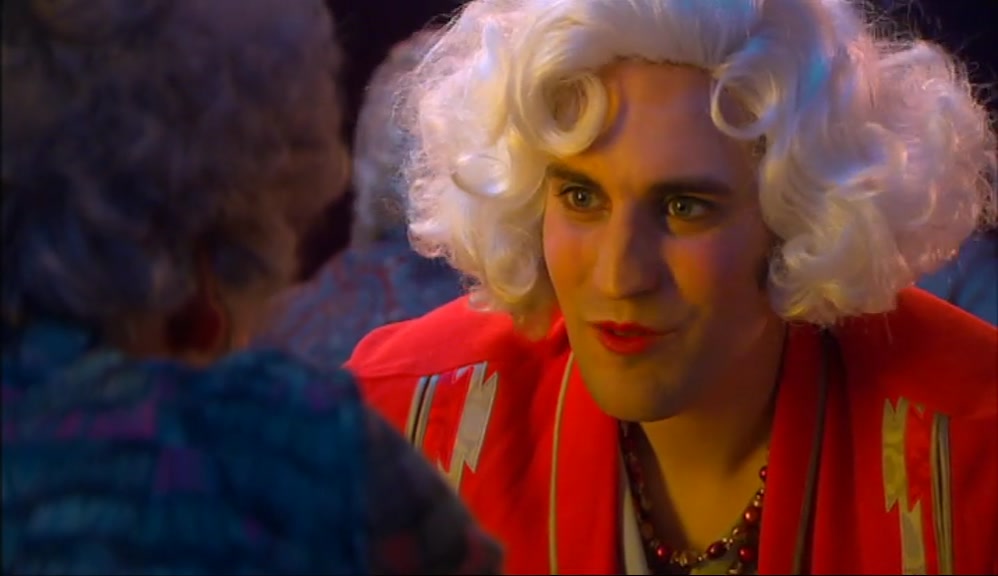 -WHAT COLOUR WAS HER CARDIGAN? -RED. 