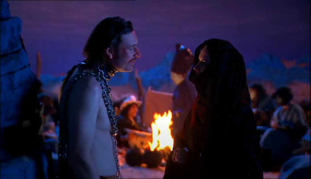 BASICALLY, YOU GO INTO HIS TENT WHEN HE IS ASLEEP, YOU OPEN THE FLAP, YOU STEAL THE AMULET.... 