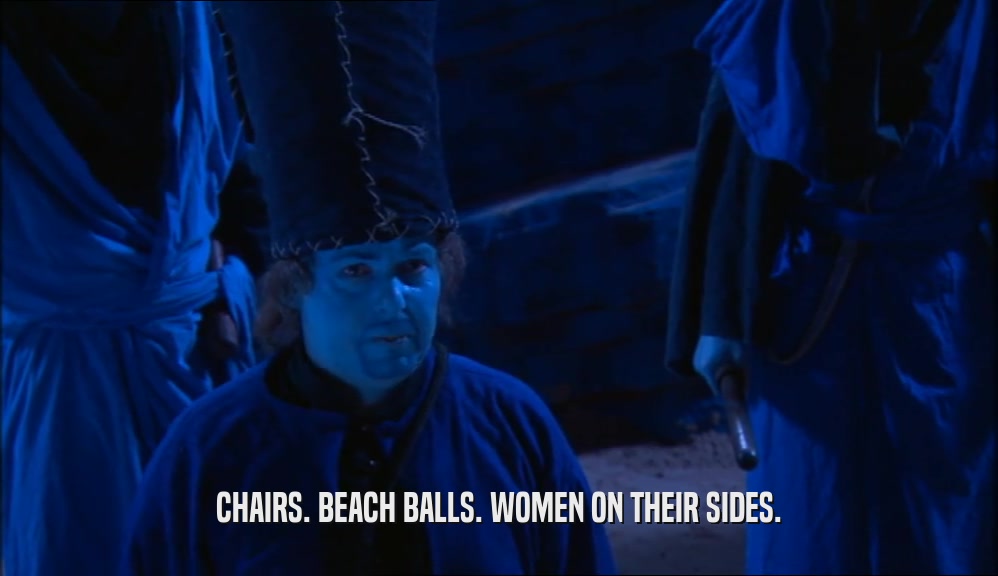 CHAIRS. BEACH BALLS. WOMEN ON THEIR SIDES.  
