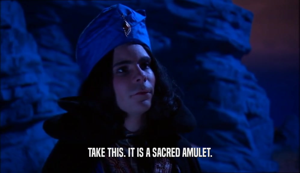 TAKE THIS. IT IS A SACRED AMULET.  