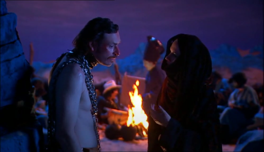 BASICALLY, YOU GO INTO HIS TENT WHEN HE IS ASLEEP, YOU OPEN THE FLAP, YOU STEAL THE AMULET.... 
