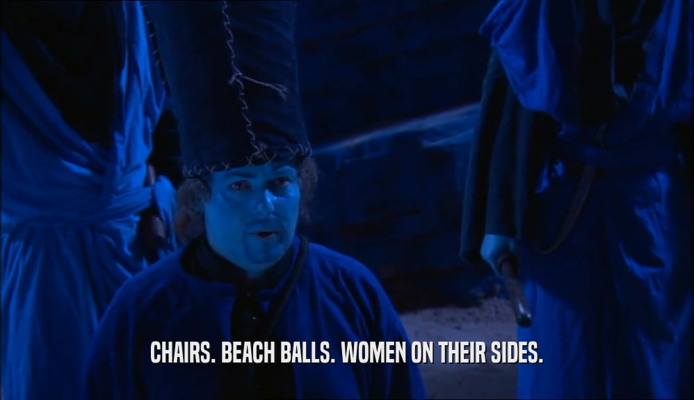 CHAIRS. BEACH BALLS. WOMEN ON THEIR SIDES.  