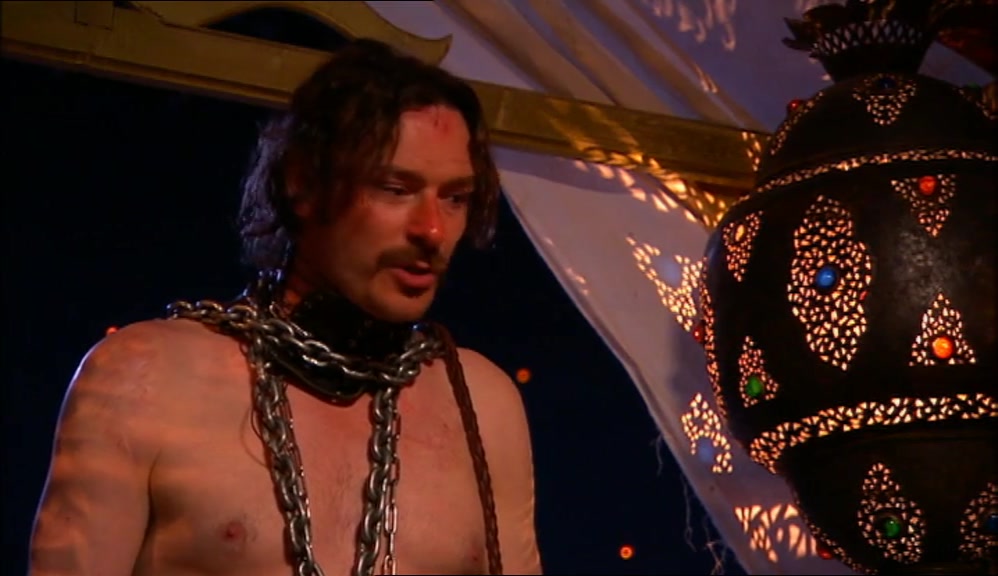 -WE'RE BEING HELD CAPTIVE BY A VIOLENT DWARF. -I'M NOT. 