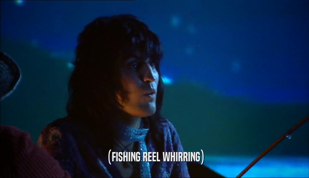 (FISHING REEL WHIRRING)
  