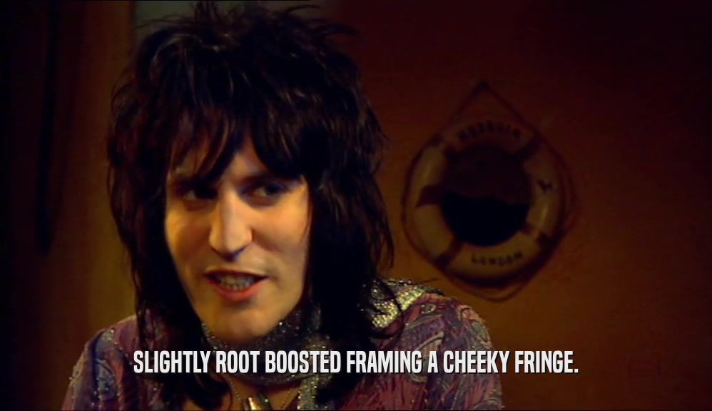 SLIGHTLY ROOT BOOSTED FRAMING A CHEEKY FRINGE.  