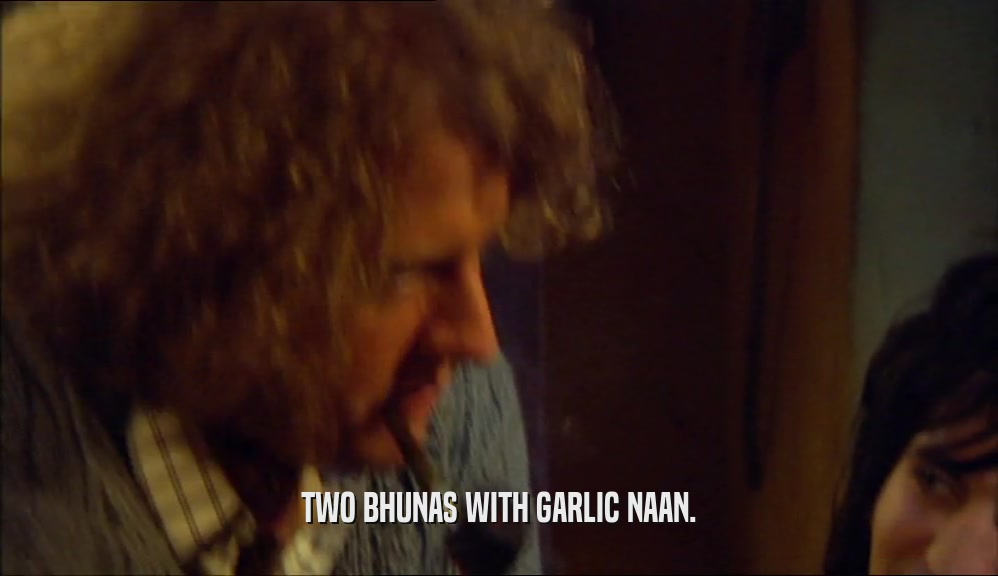 TWO BHUNAS WITH GARLIC NAAN.  