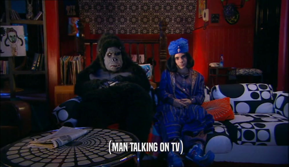 (MAN TALKING ON TV)  
