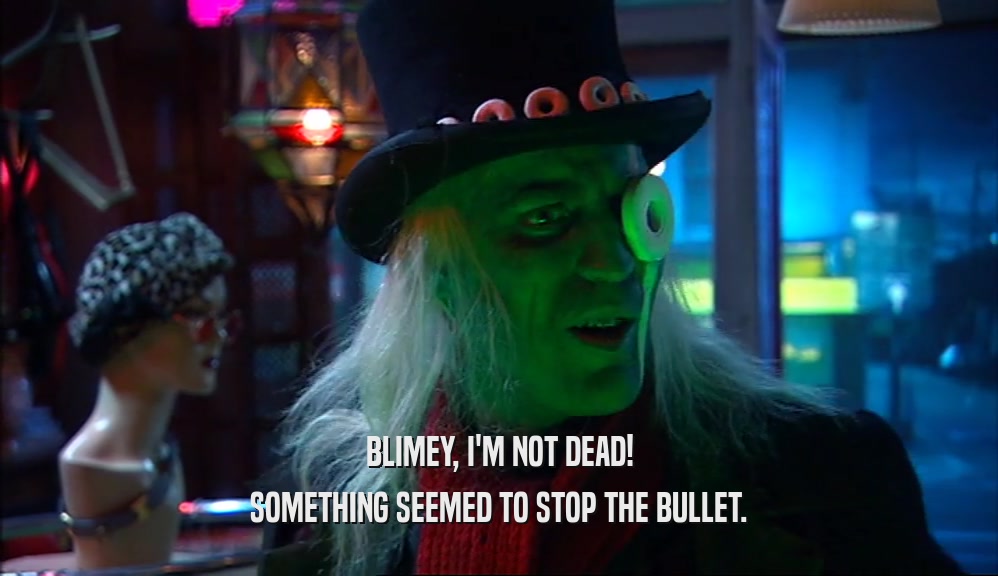 BLIMEY, I'M NOT DEAD!
 SOMETHING SEEMED TO STOP THE BULLET.
 
