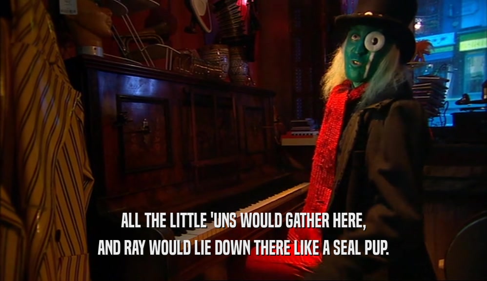 ALL THE LITTLE 'UNS WOULD GATHER HERE, AND RAY WOULD LIE DOWN THERE LIKE A SEAL PUP. 
