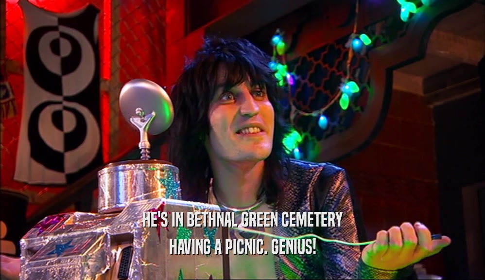 HE'S IN BETHNAL GREEN CEMETERY HAVING A PICNIC. GENIUS! 