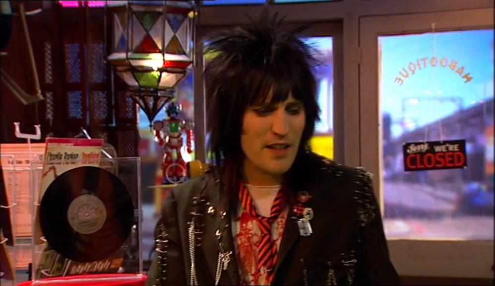 I'M NOT GLUE-SNIFING. I'M MAKING A SCRAPBOOK OF MY FAVOURITE PUNKS. 