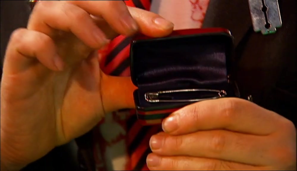 IS THAT ONE OF MY SAFETY PINS? IT SHOULD BE TUCKED AWAY IN SAFETY PIN COTTAGE. 