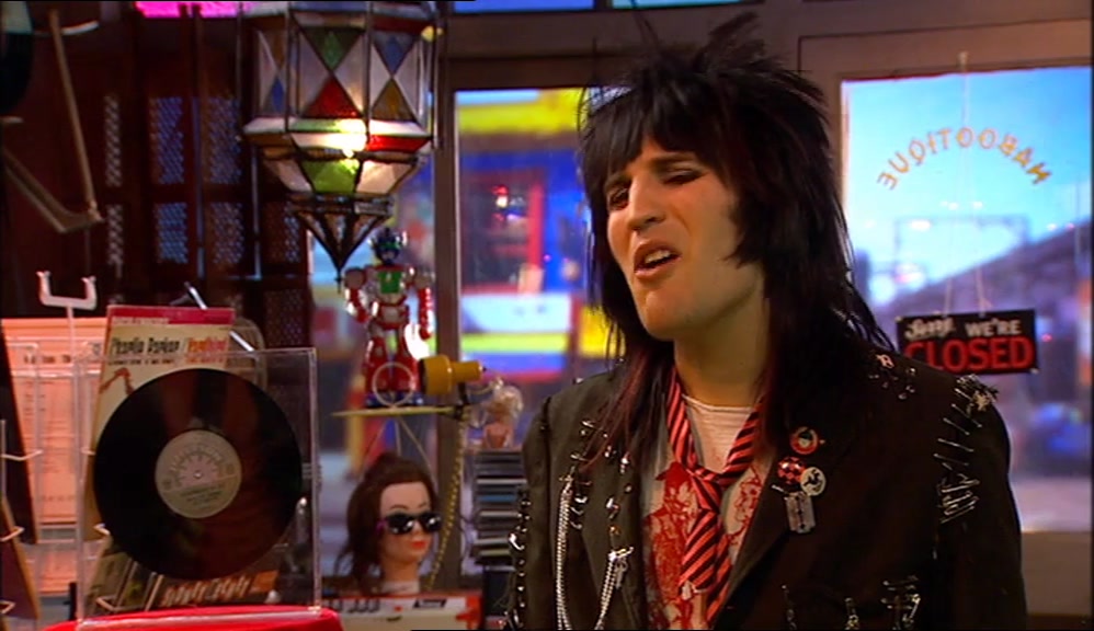 I'M NOT GLUE-SNIFING. I'M MAKING A SCRAPBOOK OF MY FAVOURITE PUNKS. 
