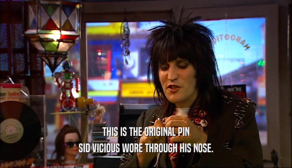 THIS IS THE ORIGINAL PIN SID VICIOUS WORE THROUGH HIS NOSE. 