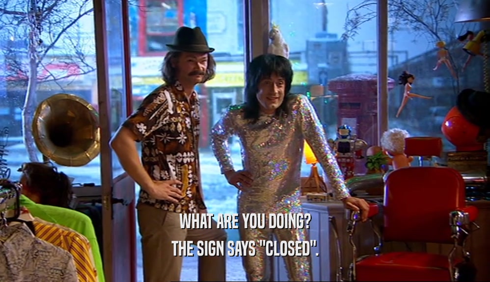WHAT ARE YOU DOING? THE SIGN SAYS 