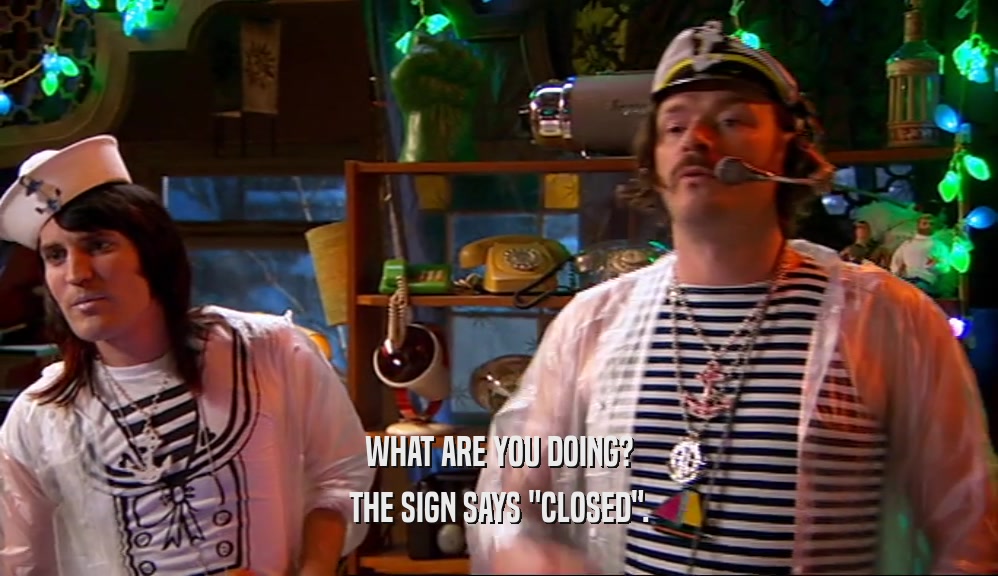 WHAT ARE YOU DOING? THE SIGN SAYS 