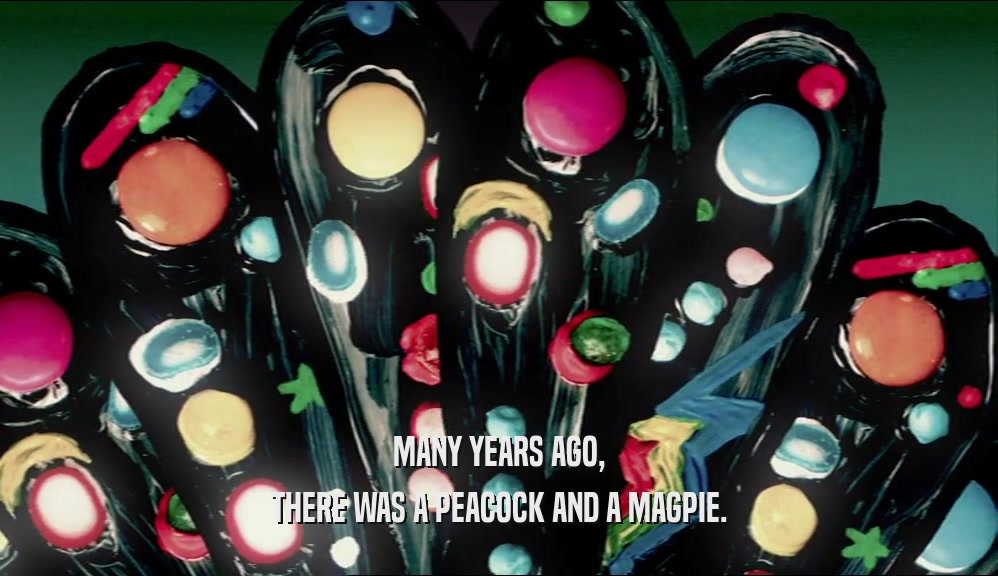 MANY YEARS AGO, THERE WAS A PEACOCK AND A MAGPIE. 