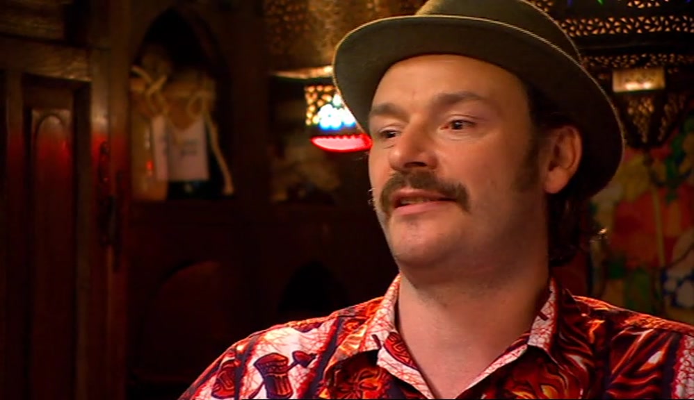 AND HE HAD THE LIGHT, SUNNY, SIMPLETON FEEL.  