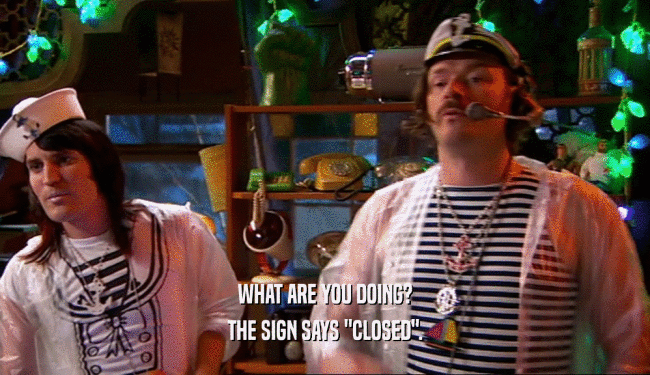 WHAT ARE YOU DOING? THE SIGN SAYS 