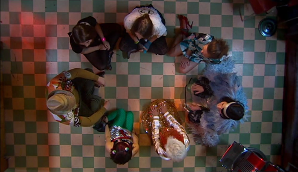 WE'RE GONNA PLAY A LITTLE GAME NOW, A LITTLE GAME CALLED SPIN THE BOTTLE. 