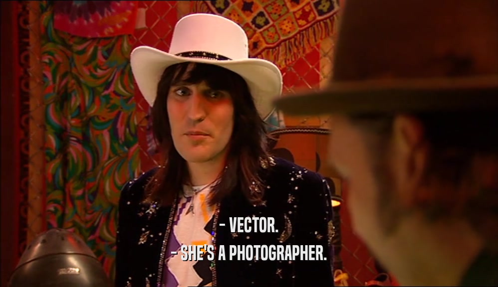 - VECTOR.
 - SHE'S A PHOTOGRAPHER.
 