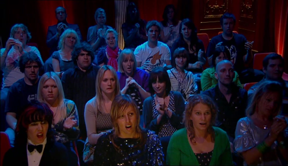 - (WOMAN SCREAMS) - (AUDIENCE GASP) 