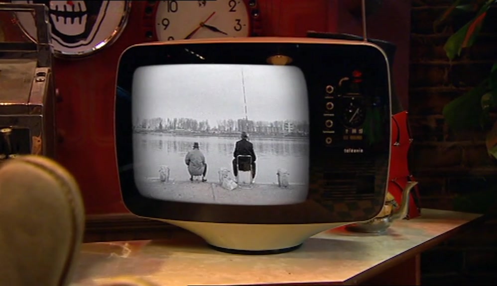 (MAN ON TV) LIFE IS PAIN.  