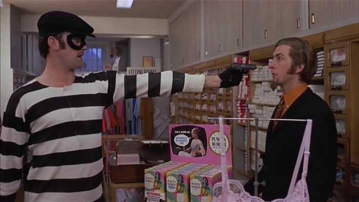 GOOD MORNING. I'M A BANK ROBBER.  