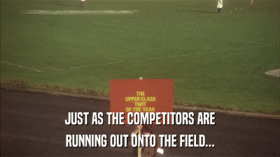 JUST AS THE COMPETITORS ARE RUNNING OUT ONTO THE FIELD... 