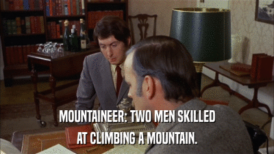 MOUNTAINEER: TWO MEN SKILLED AT CLIMBING A MOUNTAIN. 