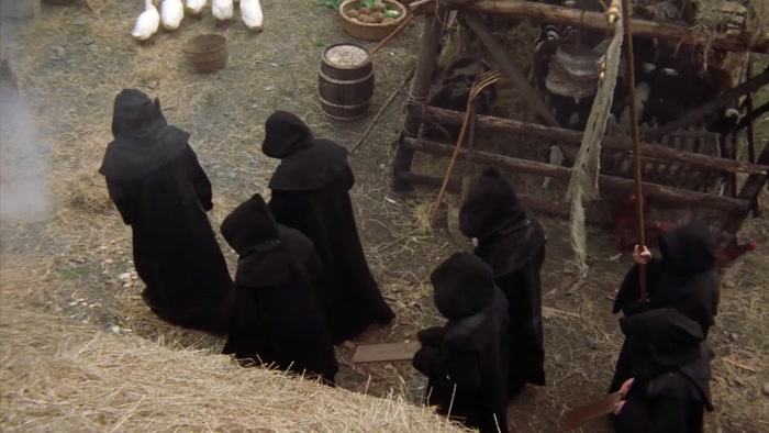 WOMAN: A WITCH! MAN: WE FOUND A WITCH. 