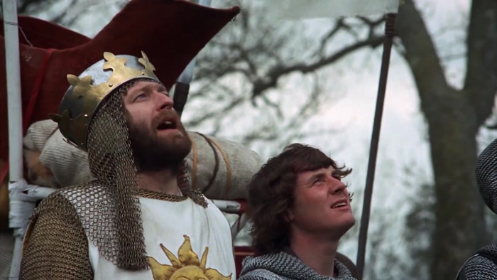 IT IS KING ARTHUR, AND THESE ARE MY KNIGHTS OF THE ROUND TABLE. 