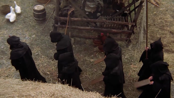 WOMAN: A WITCH! MAN: WE FOUND A WITCH. 