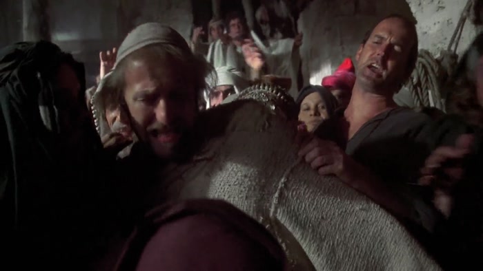 DON'T PUSH THAT BABY IN THE SAVIOUR'S FACE! HE'LL TOUCH IT LATER! 