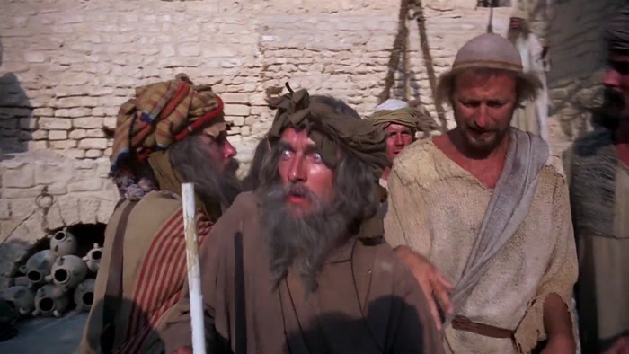 WHAT WON'T HE TELL US? MAN: HE WON'T SAY. 