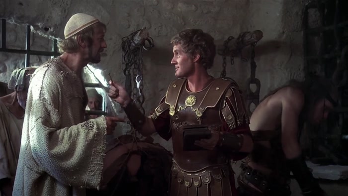 EXCUSE ME? THERE'S BEEN A MISTAKE. JUST A MOMENT, WOULD YOU? JAILER? 