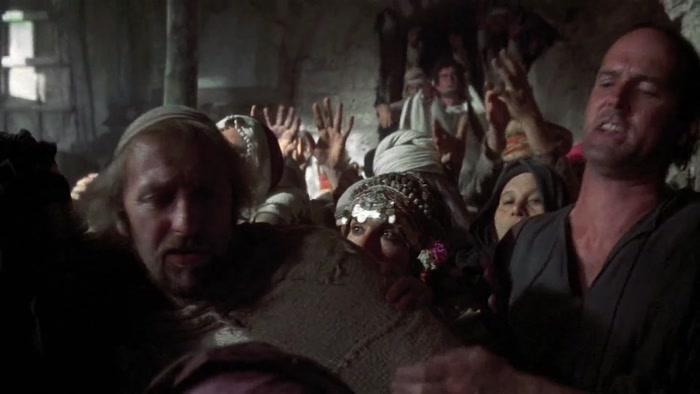 DON'T PUSH THAT BABY IN THE SAVIOUR'S FACE! HE'LL TOUCH IT LATER! 