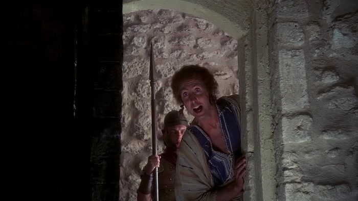 GET A MOVE ON, BIG NOSE! THERE'S PEOPLE WAITING TO BE CRUCIFIED OUT HERE! 