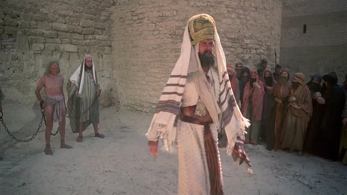 NOW, LOOK. NO ONE IS TO STONE ANYONE UNTIL I BLOW THIS WHISTLE. 