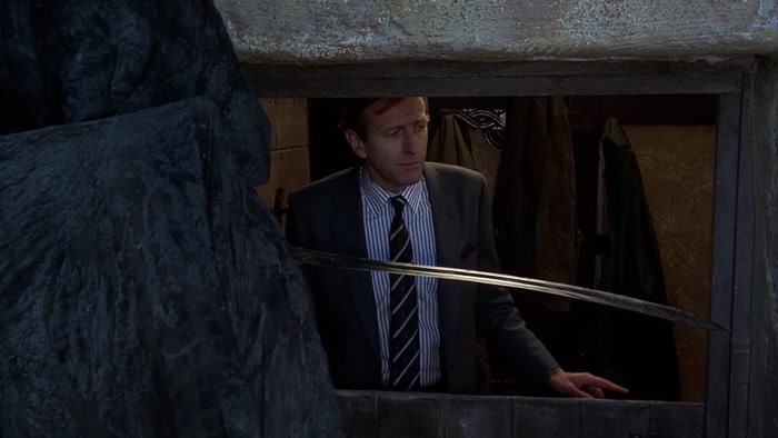 WOMAN: WHO IS IT, DARLING? IT'S A MR. DEATH OR SOMETHING. 