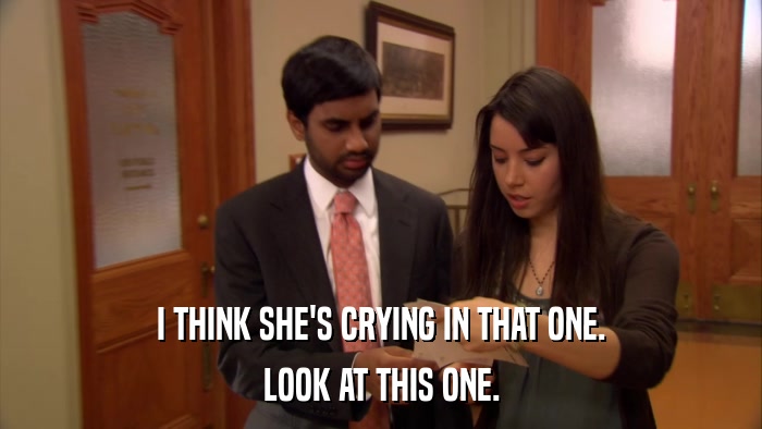 I THINK SHE'S CRYING IN THAT ONE. LOOK AT THIS ONE. 