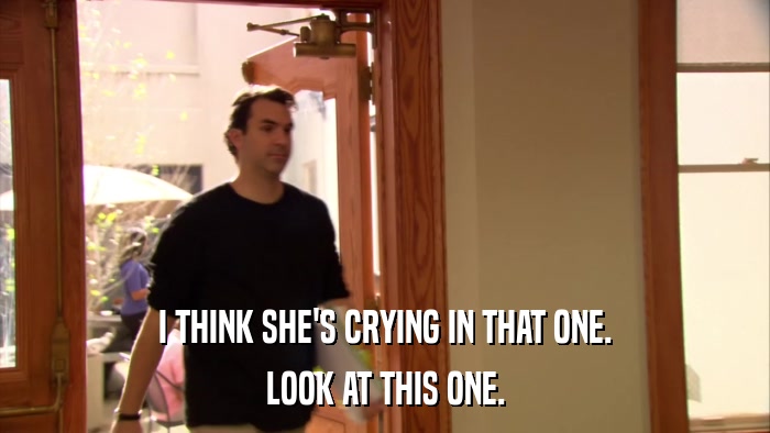 I THINK SHE'S CRYING IN THAT ONE. LOOK AT THIS ONE. 