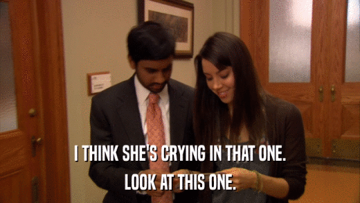 I THINK SHE'S CRYING IN THAT ONE. LOOK AT THIS ONE. 