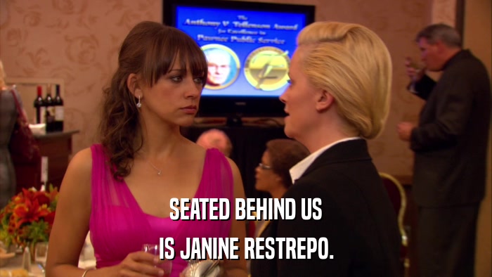 SEATED BEHIND US IS JANINE RESTREPO. 