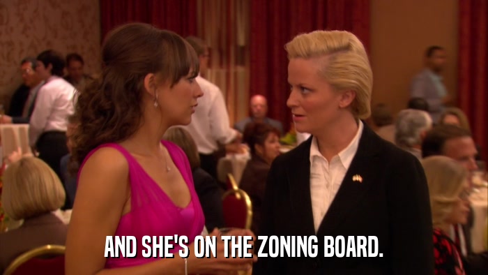 AND SHE'S ON THE ZONING BOARD.  