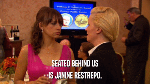 SEATED BEHIND US IS JANINE RESTREPO. 