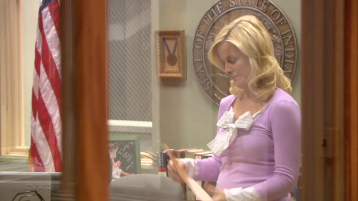 LESLIE AND THE CAMERAMAN HAVE HAD A MOMENT. 
